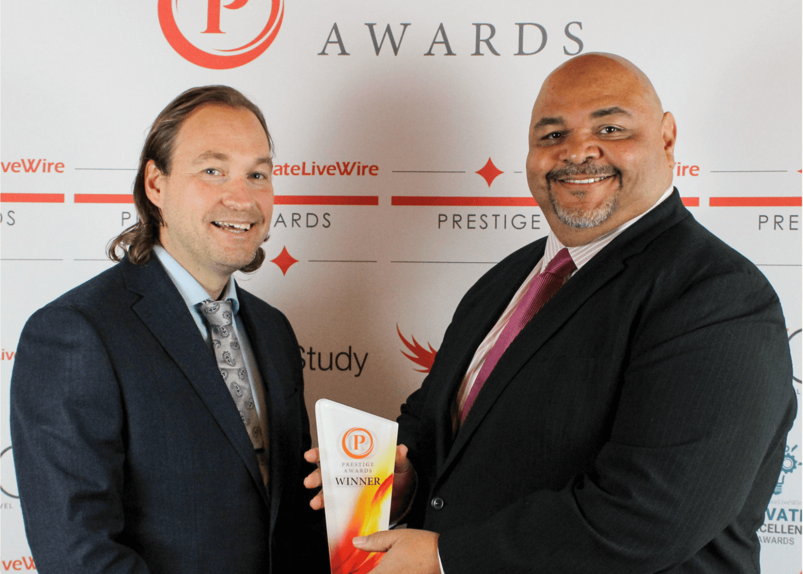 Peter Huckerby collecting an industry award